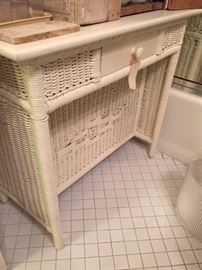 Antique (circa 1915) wicker desk with small drawer and a hidden compartment