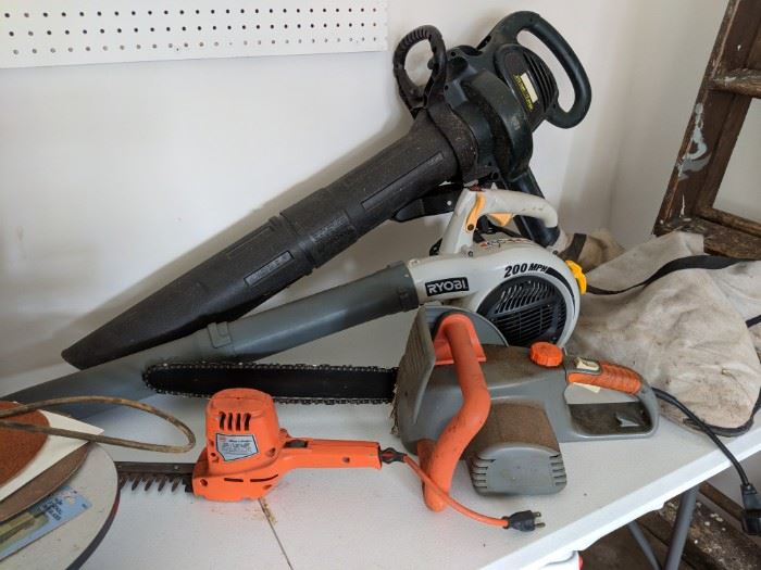 leaf blower, chainsaw and hedge trimmers
