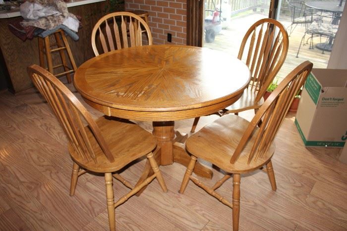 Nice round dining table and four chairs