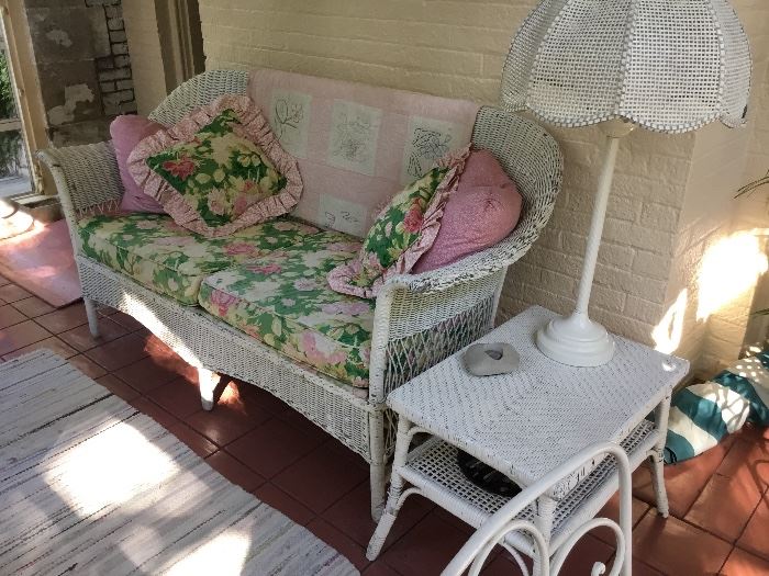 Antique white wicker 4 piece set. Sofa, rocker, end table and round table $650