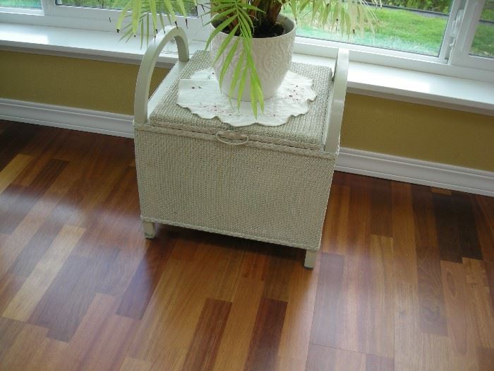 Antique commode and plant