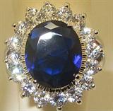 Large Sapphire CZ Stone Surrounded by Clear CZ Stones, Set in Heavy White Gold