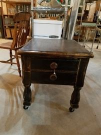 Vintage side table with casters