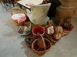 Various baskets, linens, accordion-style wall rack