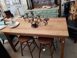 Vintage wood table, stools, candle holder, gravy boat and dish.