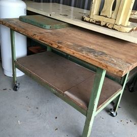 This is a second slightly smaller vintage island on casters.