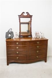 Serpinte Front 8 Drawer Mahogany Chest.  (57" w x 34"h x 22"d):  $375.00. Antique Mirror. (Overall size:  (38"l x 22"w):  $90.00