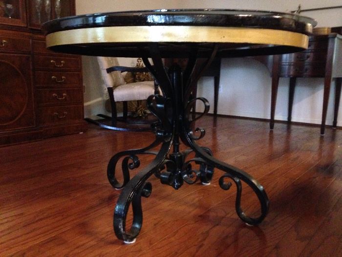 Iron Base Table w/Glass Top. (28"h x 39"d):  $195.00