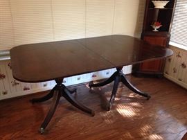 Duncan Phife 1930's Double Pedestal Dining Table.  {2-2' w extensions and felt pad cover included}  43"w x 30"h x 62"l:  $450.00.   Corner Cabinets. (77"h x 17.5"w):  $300.00