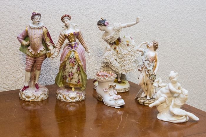 Left To Right:  Royal Courtiers (pr) $120.00 (as is). Porcelain Boot:  $6.00. Porcelain Ballerina Figurine:  $60.00. Figurine w/Sheath:  $75.00. Churub & Peacock:  $19.50