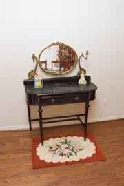 Vintage Black Vanity and Attached Gilt Framed Mirror .  (52"h [overall]/32"h to surface x 38"w x 18"d). $165.00 (as is). Vintage Hooked Rug.  $45.00. First Dance Figurine:  $45.00