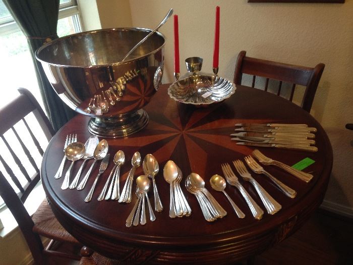 Silver Plate Punch Bowl and Ladle:  $75.00. Silver Plate Shell Server:   $19.50.  Sixty piece Silver Plate Flatware:  $60.00