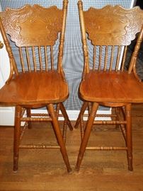 Matching oak press back swivel bar stools
