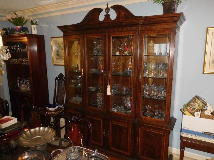 Beautiful flame mahogany inlaid breakfront china cabinet....matches table & 8 chairs