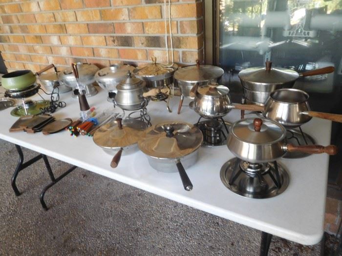 Collection of vintage fondue pots