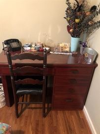 Knee hole desk with antique chair