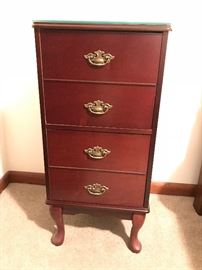 Love this piece. Classic mahogany wood. The look of a chest but yet it is a file cabinet!