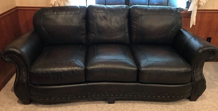 The second of the leather sofas available.