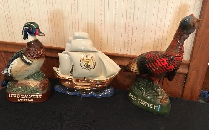 Liquor decanters. Vintage. Lord Calvert duck. No. 6 Wild Turkey and a ship ready to sail.