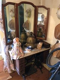 Trendle sewing machine, folding mirror on wall