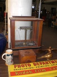 scientific balance scale in wood and glass case