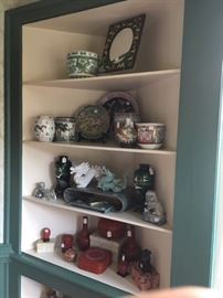 More Asian decor.  Chinoiserie, ceramics, pots, stands