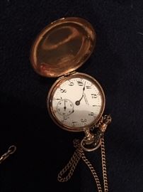 One of two gold pocket watches