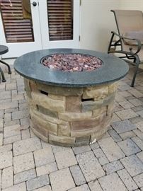 LP Tank has portable fire pit with custom cover.