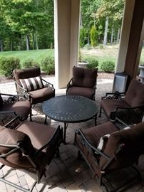 outdoor furniture to include Table and 4  Chairs.  In addition 2 are rockers.