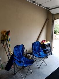 camping chairs, tools, cleaning equipment and saw horses.