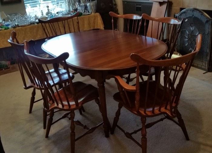 Tell City Cherrywood table with 6 chairs, 2 leaves and all pads.