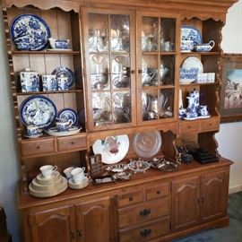 China cabinet with silver plate and blue willow