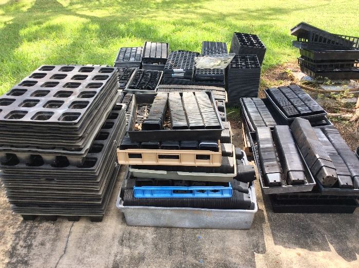 Very Large Number of Plastic Nursery Plant Trays and Individual Containers.