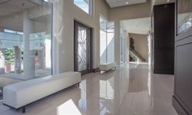 Custom made napkin benches with leather upholstery and metal base By Christian Liaigre at Holly Hunt