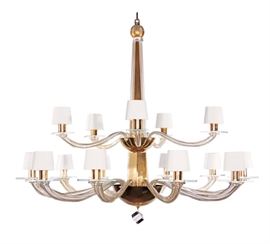 Donghia Stellare Grande Chandelier, Murano Glass in Gold Dust.  A stunning hand blown Venetian glass chandelier with two tiers of arms and infinite charm. Two-tier fifteen-arm chandelier in handblown Murano glass. Clear glass with gold leaf inclusions, hand-silvered glass, and brass hardware.  - Canopy dimensions: 5.5"" diameter. - Included chain length: 5 feet. Modern Contemporary 21st Century made in Italy