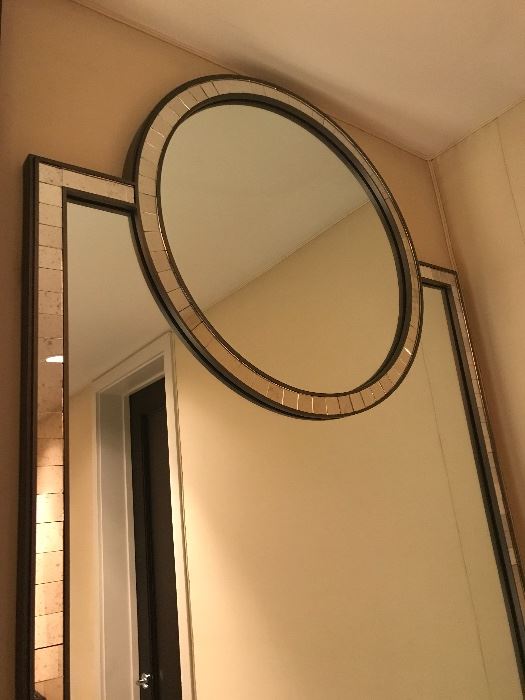 Designer metal frame accent mirror with gunmetal finish and mercury mirror tile detail, 36” W x 63” H. 