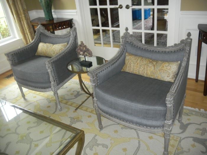 pair of pointed top chairs, dark grey fabric, with weathered, mahogany wood base