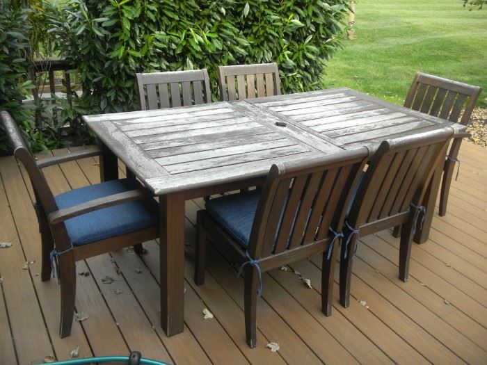 outdoor dining table with matching server/bar.  Top needs refinishing, but structurally sound. By Pottery Barn