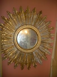 antique decorative sun mirror, 24" wide, hand-carved frame, gold leaf finish