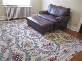AREA RUG AND CHAIR AND OTTOMAN