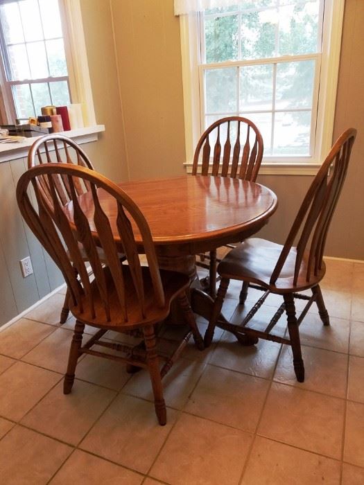 Oak Pedestal Dining Table & Four Chairs: http://www.ctonlineauctions.com/detail.asp?id=763045