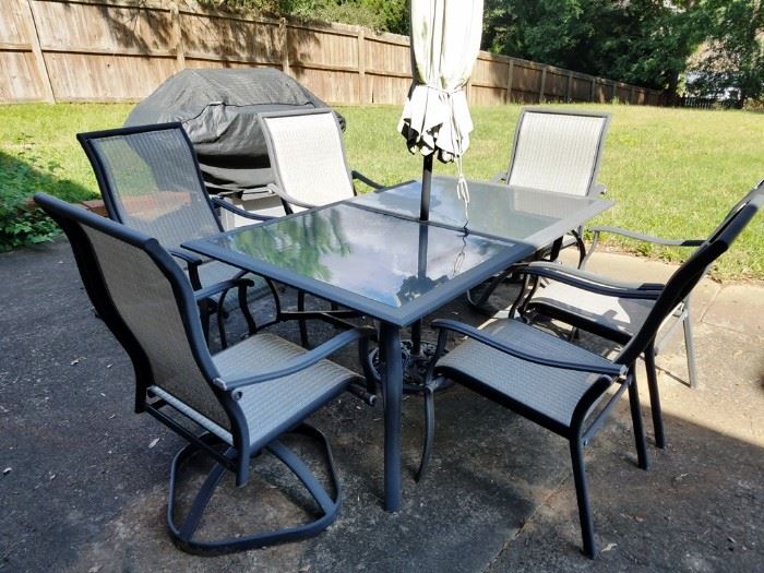 Metal and Glass Patio Table & Six Chairs: http://www.ctonlineauctions.com/detail.asp?id=763677