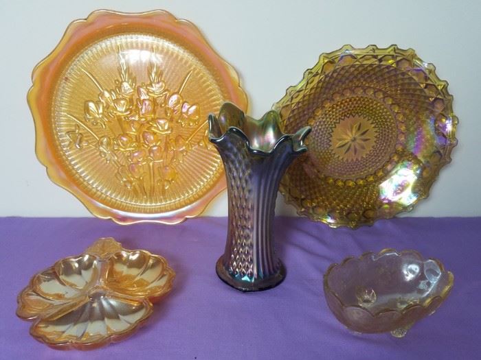 Five Pieces of Carnival Glass:  http://www.ctonlineauctions.com/detail.asp?id=763785