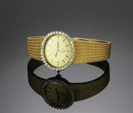 18K Gold Watch with Diamond Bezel Universal