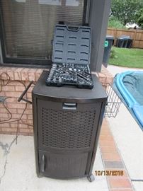 Outdoor Suncast Cooler with storage, socket set