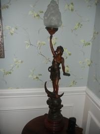 "La Liberty" lamp. Originally a gas lamp, was turned into electric in late 1930's. Original owner was the only blacksmith in the City of Yonkers, NY in late 1800's. Became friends with Charles P. Steinmetz and Thomas Edison as he was creating  the filaments for their electric light bulb experiments.