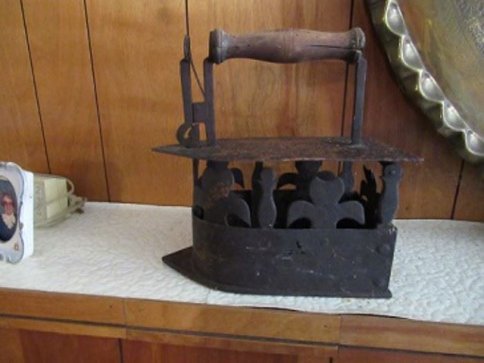 Early iron that used hot coals to heat up.