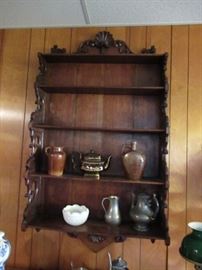 Oak 5 shelf wall shelf . The jug on right is marked  J H        The enter teapot is 18th c.  the piece on the left is a pitcher. Pewter teapot by James Dixon  Sheffield  