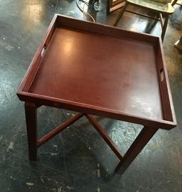 We have two of these adorable wooden tray tables that fold up for easy storage
