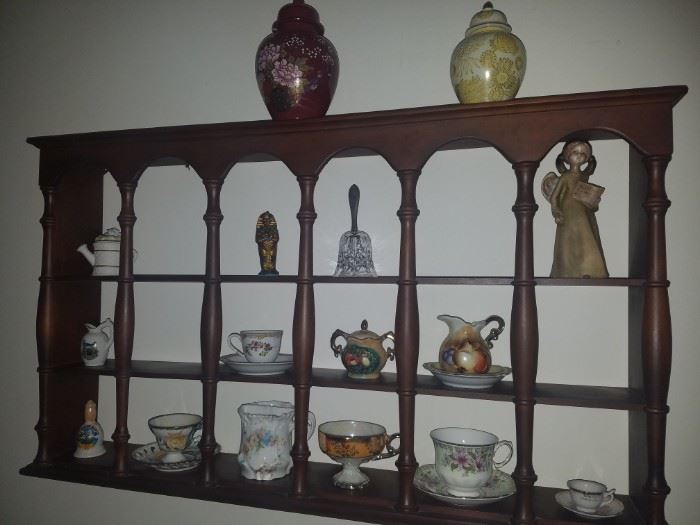 Vintage cup/saucer shelf, cups, saucers, & other collectibles.
